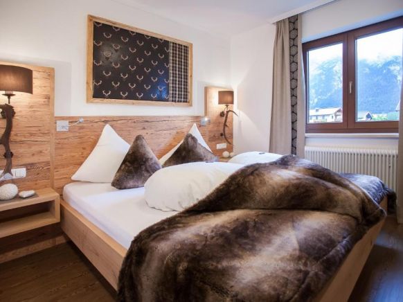 Ferienwohnungen Alpenherz, Визинг