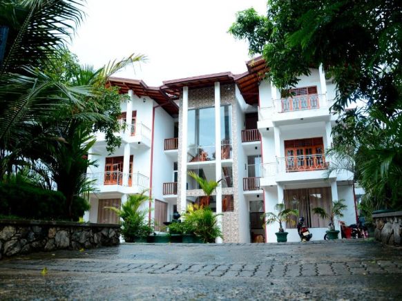 Отель Papaa Palace, Тангалла