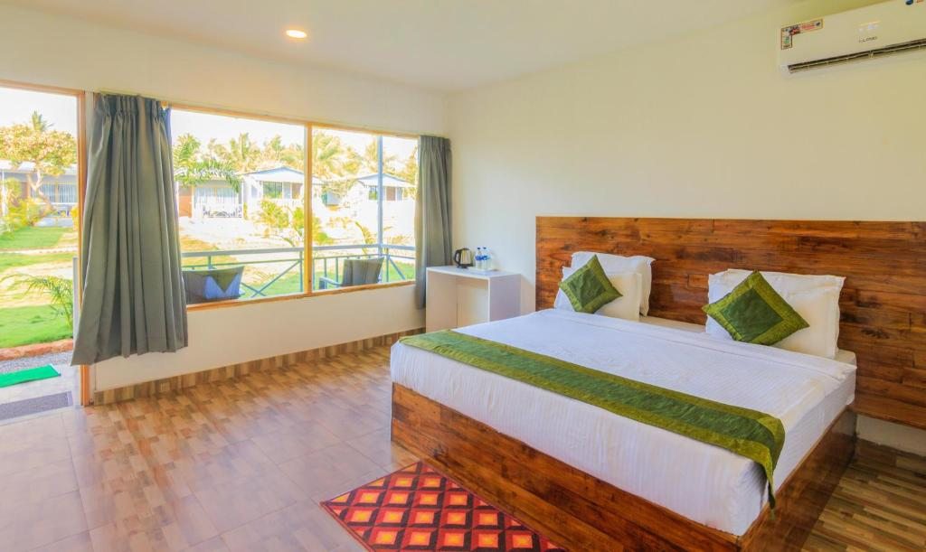 Курортный отель Treebo Lands End Beach Resort, Морджим