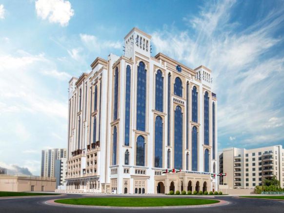 Отель Al Jaddaf Rotana Suite Hotel