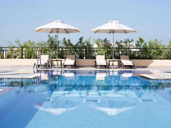 Апарт-отель Mövenpick Hotel Apartments Al Mamzar Dubai