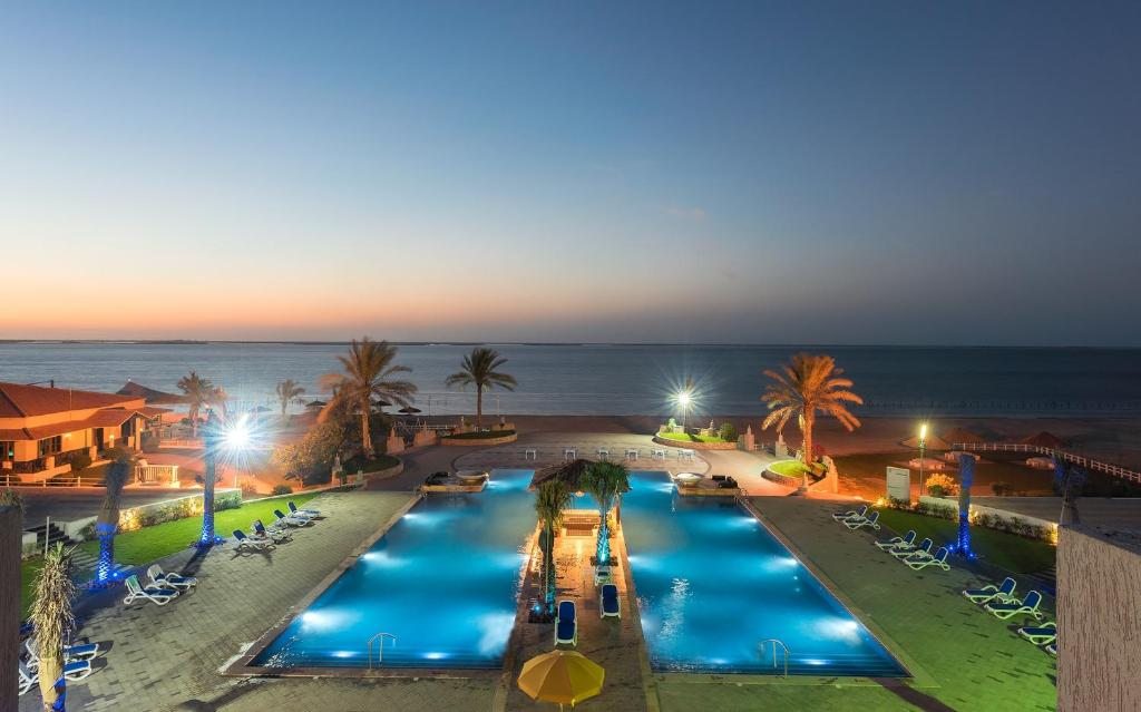 Курортный отель Barracuda Beach Resort, Умм-эль-Кайвайн