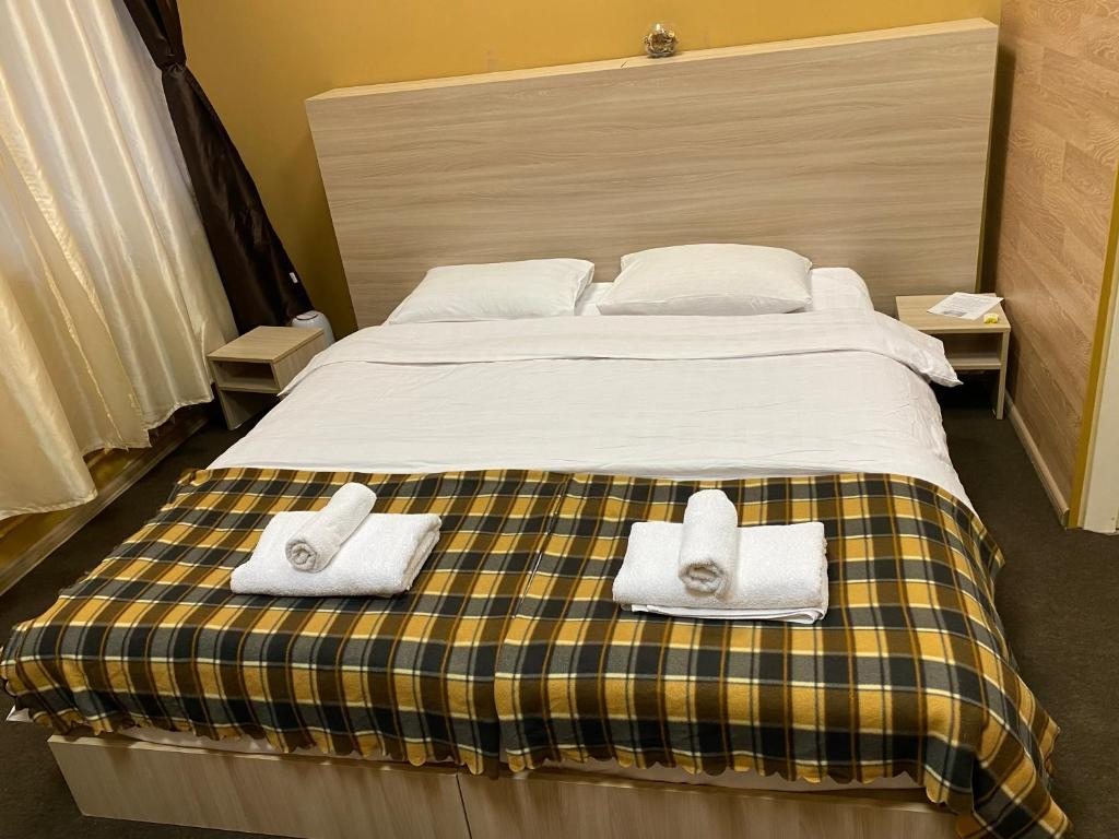 Двухместный (Просторный двухместный номер с 1 кроватью или 2 отдельными кроватями и собственной ванной комнатой) отеля Sleep in the City, Санкт-Петербург