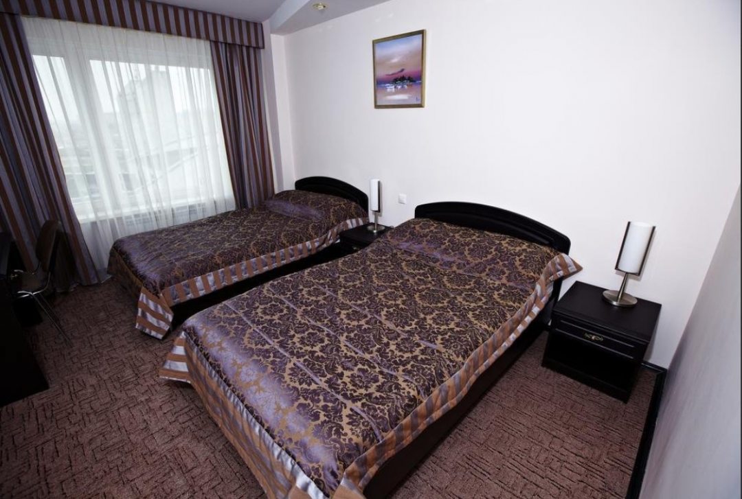Люкс (Люкс двухкомнатный с двумя раздельными кроватями) отеля Орбита, Минск