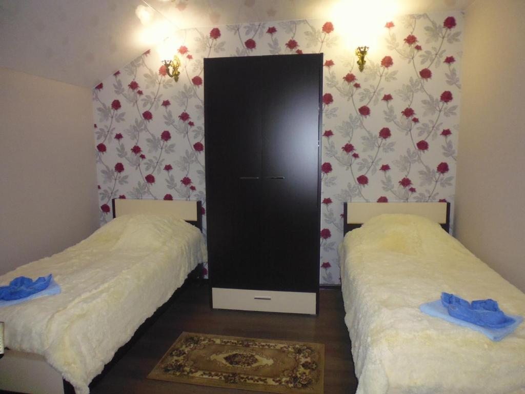 Двухместный (Двухместный номер с 2 отдельными кроватями и душем) гостевого дома Волна, Байкальск