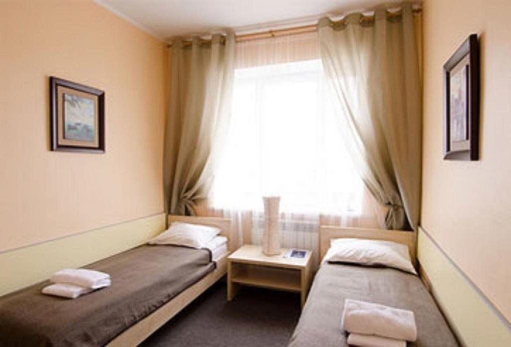 Двухместный (Двухместный номер эконом-класса с 1 кроватью и общей ванной комнатой) отеля Славянская Традиция, Могилев