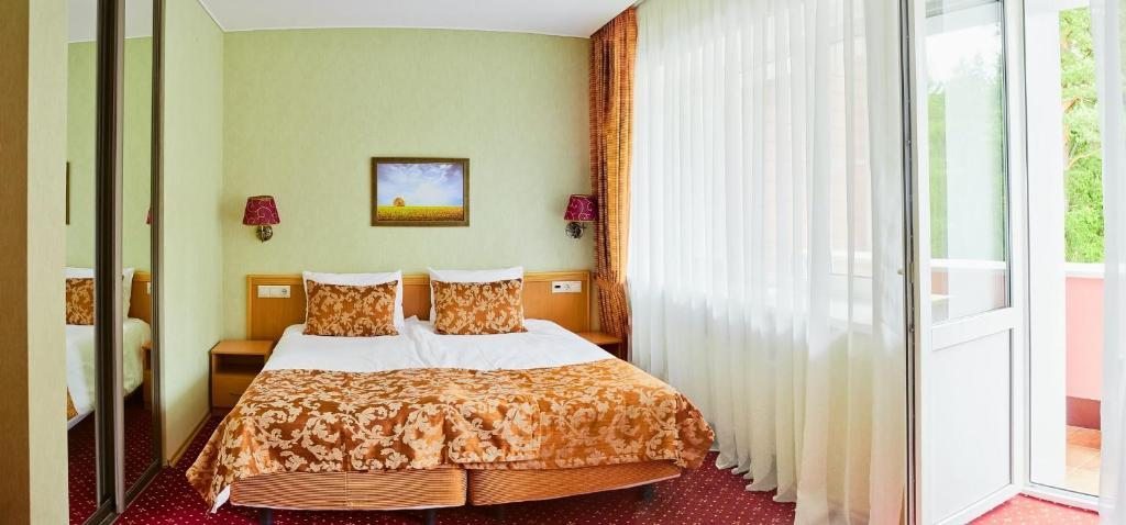 Двухместный (Классический двухместный номер с 2 отдельными кроватями) парк-отеля Бухта Коприно, Рыбинск