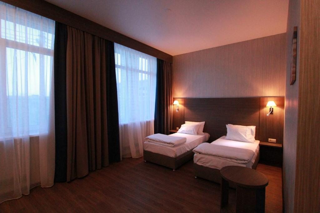 Двухместный (Двухместный номер с 1 кроватью или 2 отдельными кроватями и базовыми удобствами) отеля Art Villa, Краснодар