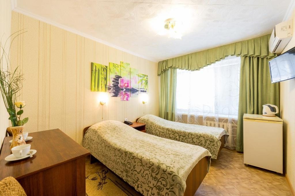 Двухместный (Стандартный двухместный номер с 2 отдельными кроватями) отеля Бузулук