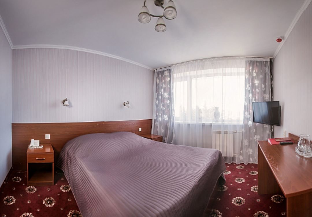 Полулюкс (Номер стандартный с широкой кроватью) гостиницы Томск