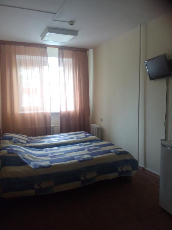 Двухместный (Стандартный двухместный номер с 2 отдельными кроватями) отеля Ажур, Тюмень