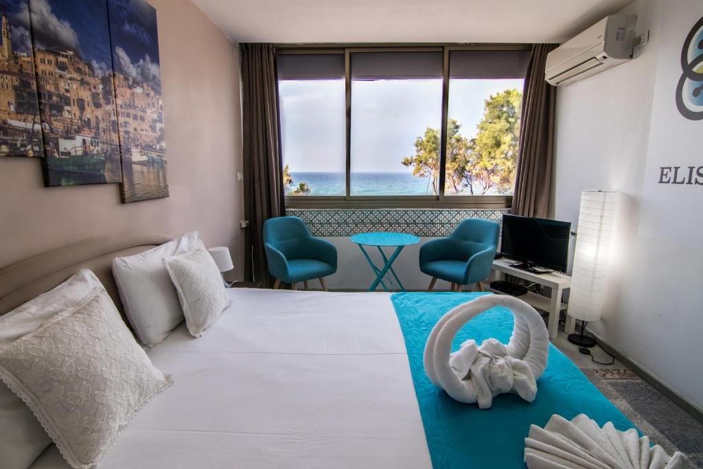 Двухместный (Двухместный номер с 1 кроватью или 2 отдельными кроватями и видом на море) отеля Elis Boutique Hotel, Бат-Ям