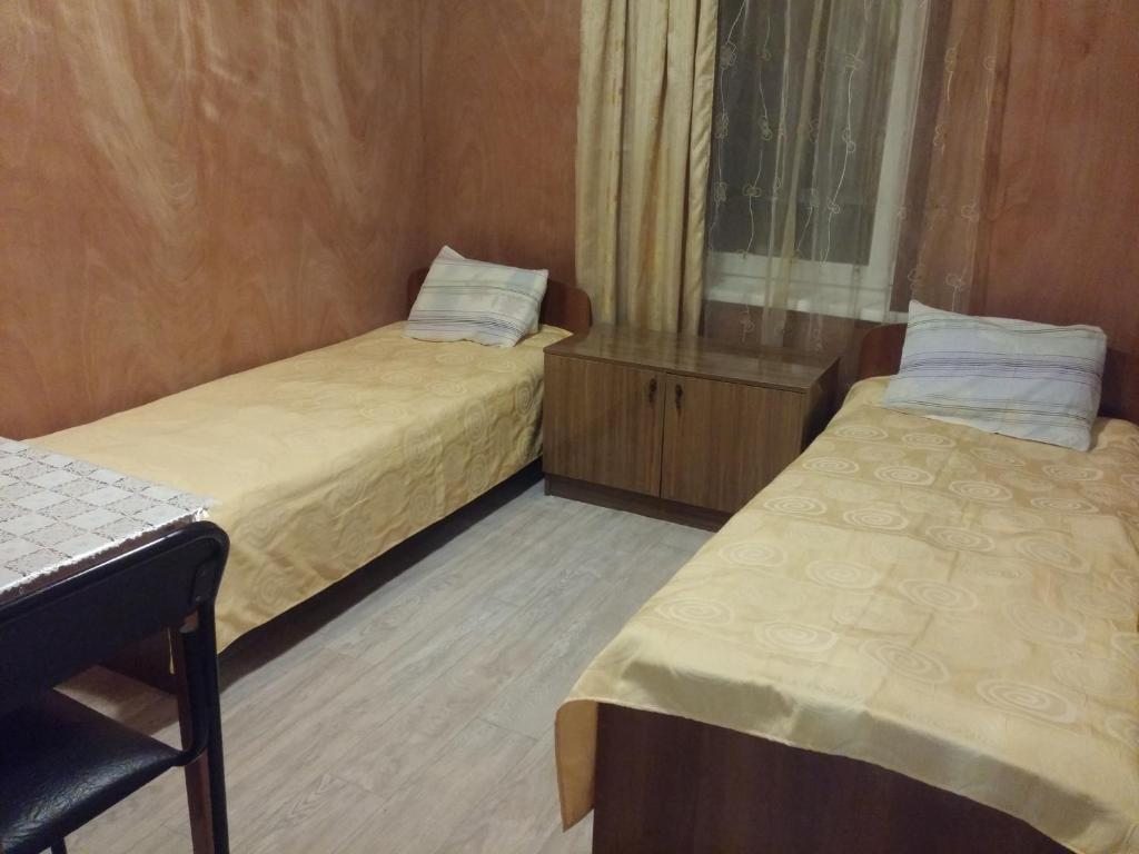 Двухместный (Двухместный номер с 2 отдельными кроватями и окном) гостевого дома Берег Байкала, Листвянка
