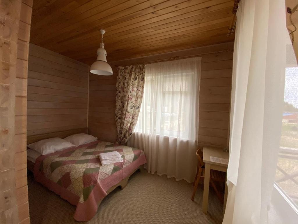 Одноместный (Стандартный одноместный номер с душем) гостевого дома Демидова, Листвянка