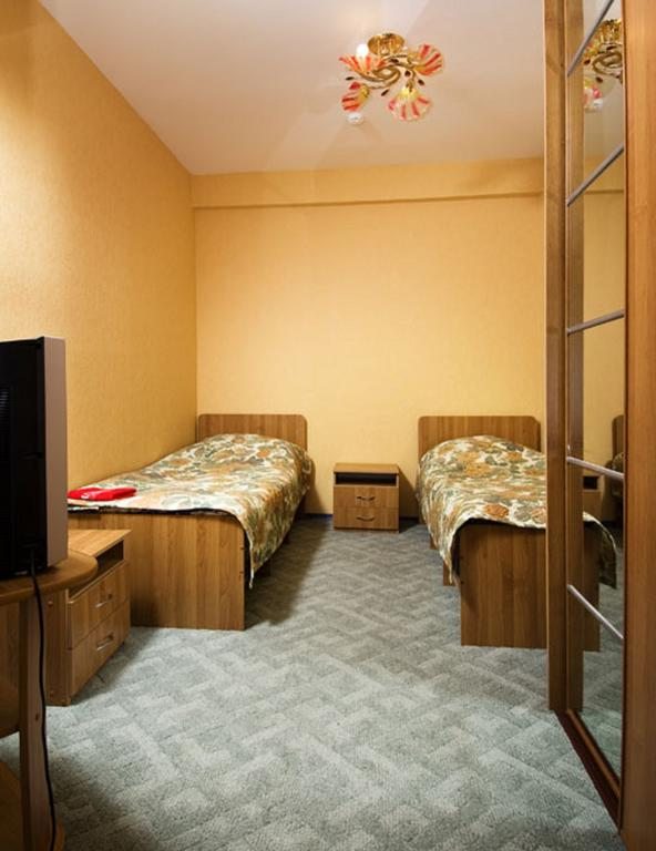 Двухместный (Двухместный номер эконом-класса с 2 отдельными кроватями) отеля Орлиное Гнездо, Байкальск