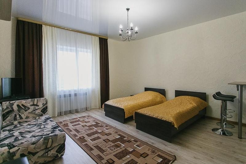 Двухместный (Двухместный номер с 2 отдельными кроватями и дополнительной кроватью) гостевого дома ColiseuM, Витебск