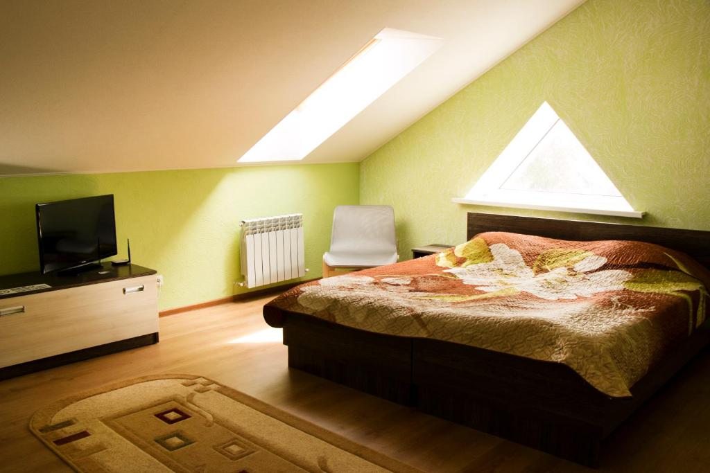 Двухместный (Стандартный двухместный номер с 2 отдельными кроватями - Мансарда) гостевого дома ColiseuM, Витебск