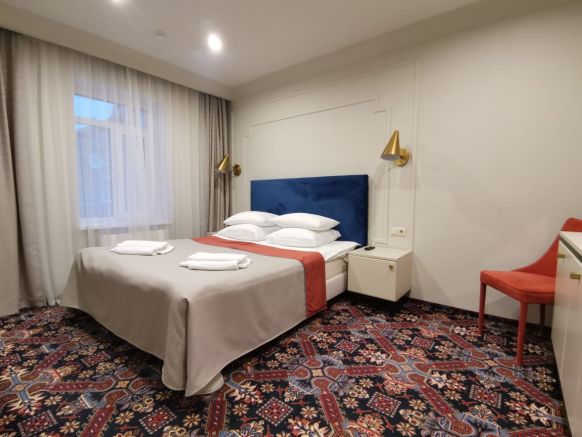 Фотография номера гостиницы История