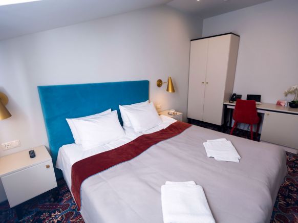 Фотография номера гостиницы История