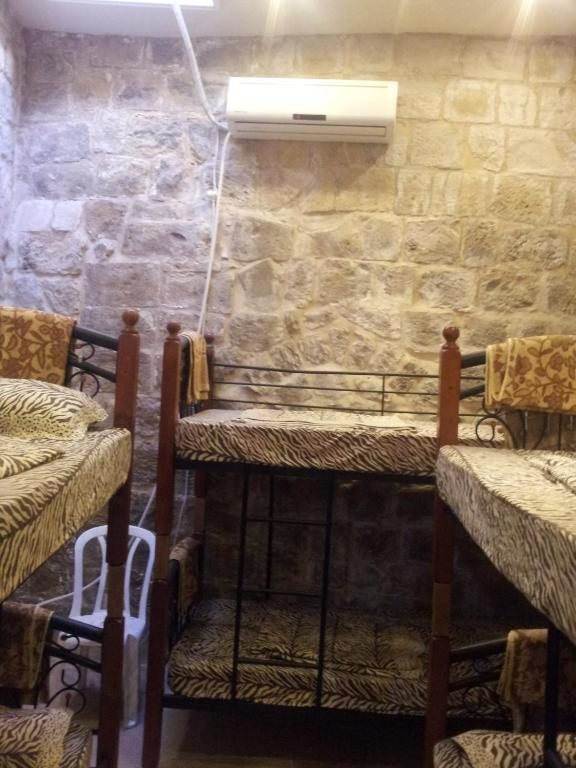 Номер (Место на двухъярусной кровати в общем 10-местном номере для женщин) хостела Chain Gate Hostel, Иерусалим