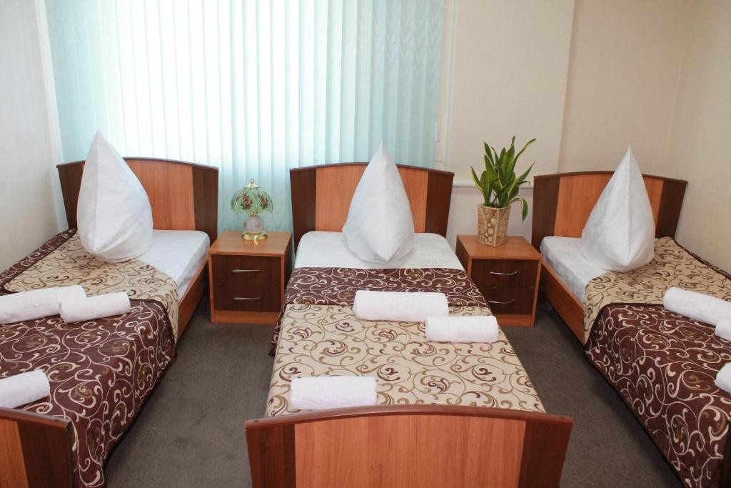Номер (Односпальная кровать в общем номере) гостиницы Полярная звезда, Белгород