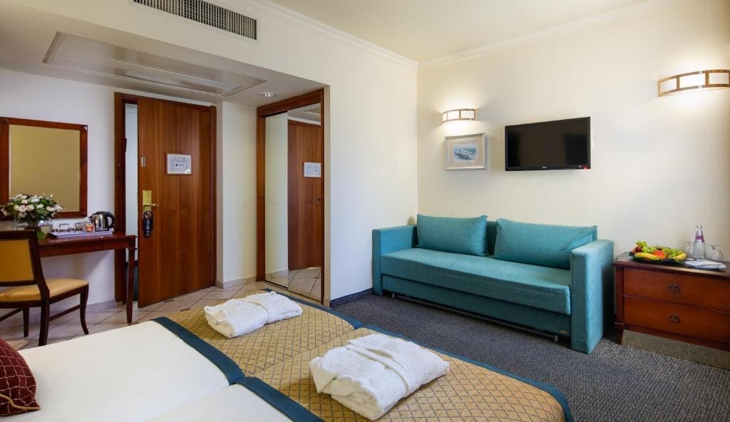 Двухместный (Двухместный номер Делюкс с 1 кроватью или 2 отдельными кроватями и балконом) отеля Prima Palace Hotel, Иерусалим