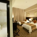 Семейный (Executive Family Triple Room (1 Double + 1 Single Bed)), St. George Hotel