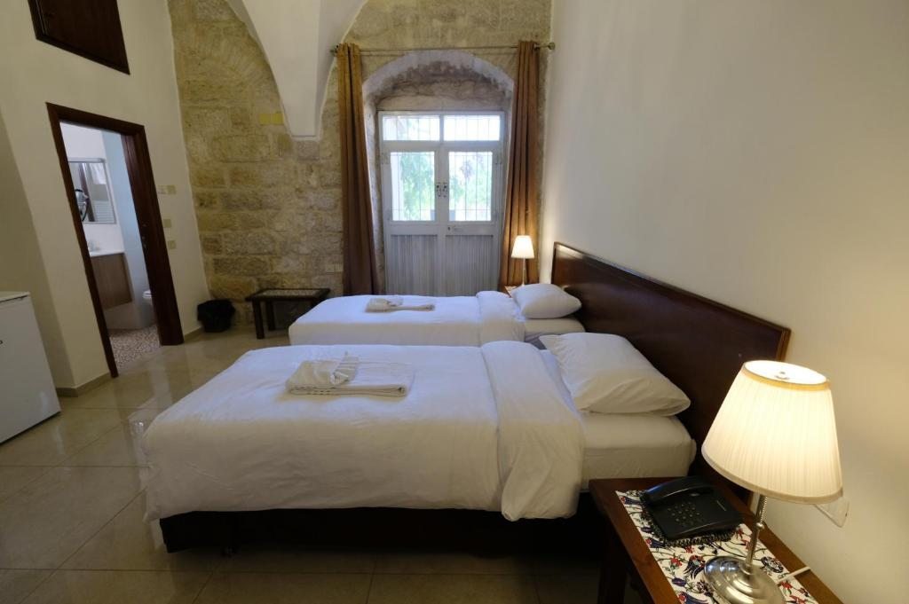 Двухместный (Двухместный номер с 2 отдельными кроватями) отеля St. George’s Cathedral Pilgrim Guesthouse – Jerusalem, Иерусалим
