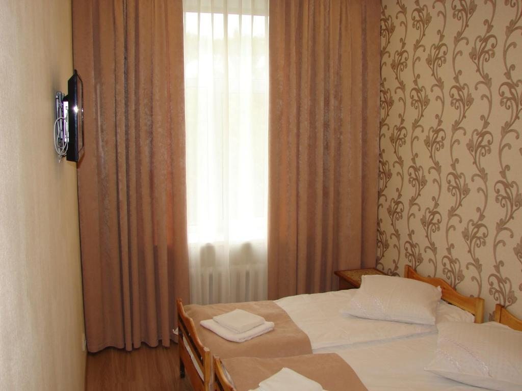 Двухместный (Стандартный двухместный номер с 2 отдельными кроватями) мини-отеля Гостиный Дом, Клин
