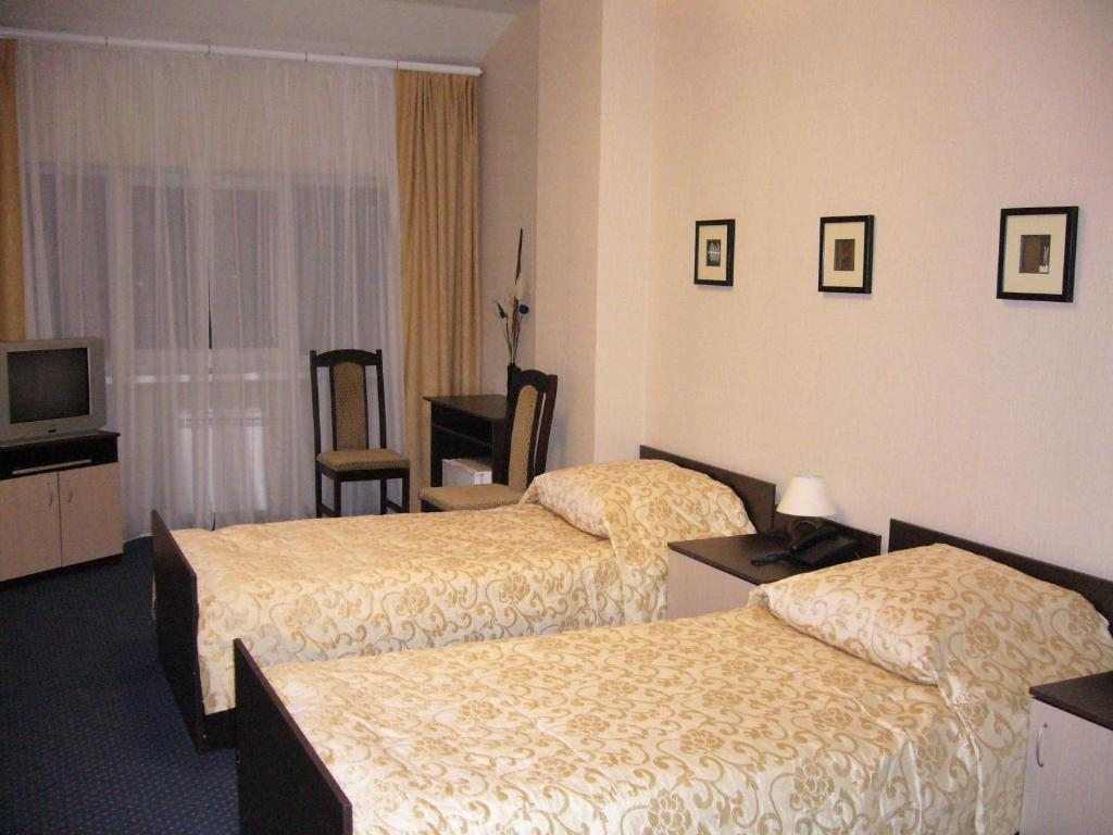 Двухместный (Двухместный номер с 2 отдельными кроватями и собственной ванной комнатой) отеля Зори, Нижний Новгород