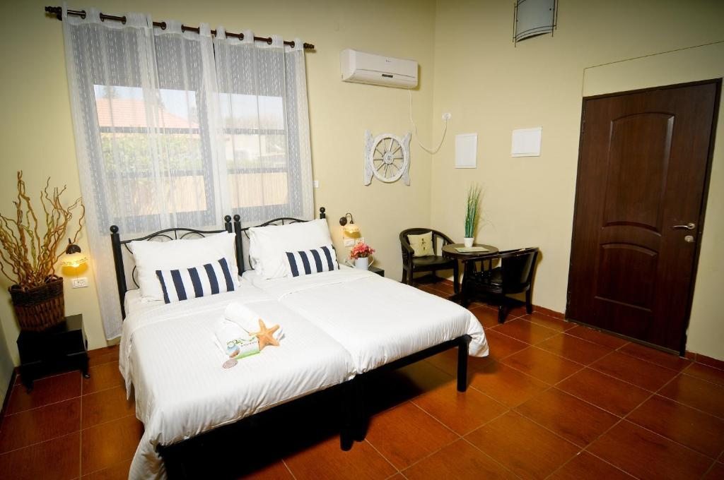 Двухместный (Двухместный номер с 1 кроватью или 2 отдельными кроватями) отеля Dolphin Village Country Lodging, Нагария