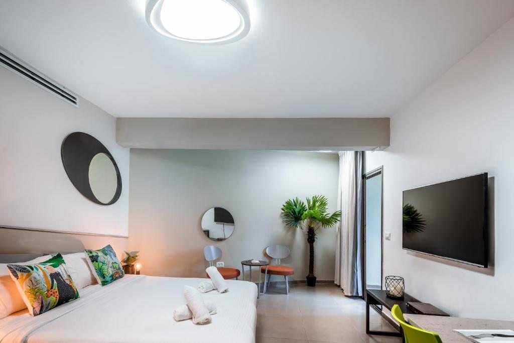 Двухместный (Двухместный номер с 1 кроватью или 2 отдельными кроватями - Подходит для гостей с ограниченными физическими возможностями) апарт-отеля Almog Eilat, Эйлат