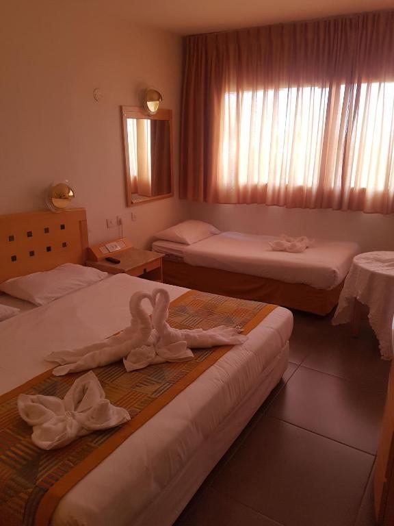 Двухместный (Двухместный номер с 1 кроватью или 2 отдельными кроватями) отеля Aquamarine Hotel, Эйлат