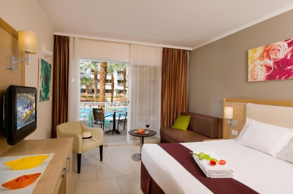 Двухместный (Двухместный номер с 1 кроватью или 2 отдельными кроватями и балконом, вид на бассейн) отеля Leonardo Royal Resort Eilat, Эйлат