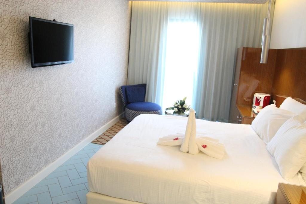 Двухместный (Двухместный номер с 1 кроватью или 2 отдельными кроватями (для 2 взрослых и 1 ребенка)) отеля Soleil Boutique Hotel, Эйлат