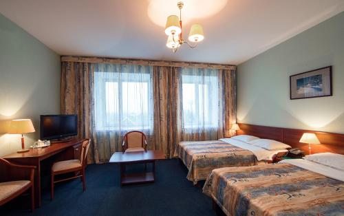 Двухместный (Стандартный двухместный номер с 2 отдельными кроватями) гостиничного комплекса На семи холмах, Ханты-Мансийск