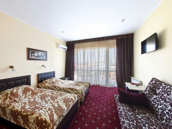 Фотография номера гостиницы Тополь