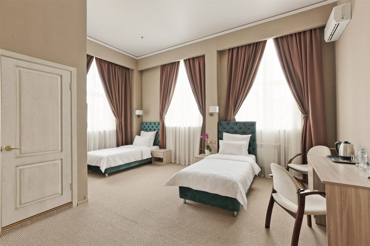 Номер (Улучшенный двухместный с двумя односпальными кроватями), Гостиница Fortis