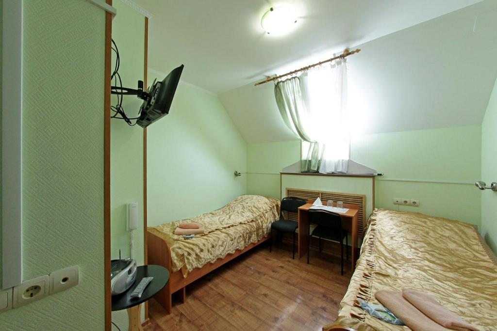 Двухместный (Стандартный двухместный номер с 2 отдельными кроватями) гостевого дома Грёзы, Москва