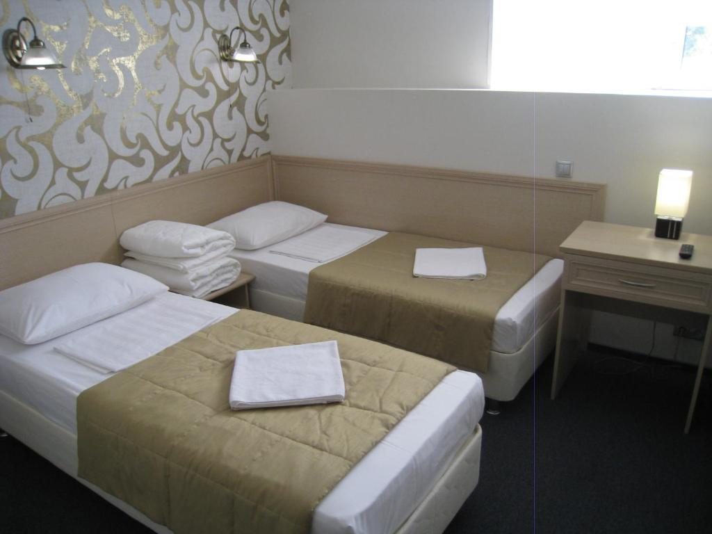Двухместный (Улучшенный двухместный номер с 1 кроватью или 2 отдельными кроватями) отеля Комфорт Москва
