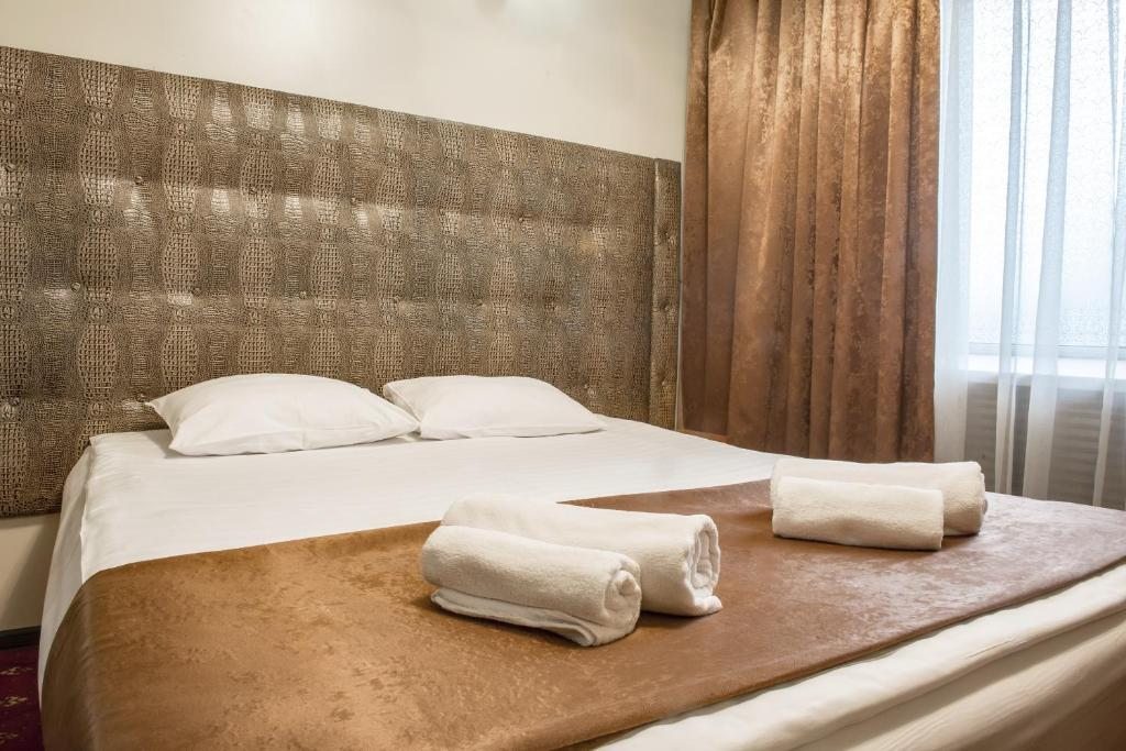 Двухместный (Стандартный двухместный номер с одной большой кроватью или двумя отдельными кроватями, ванная комната. Вид на реку) отеля Строгино Экспо, Москва