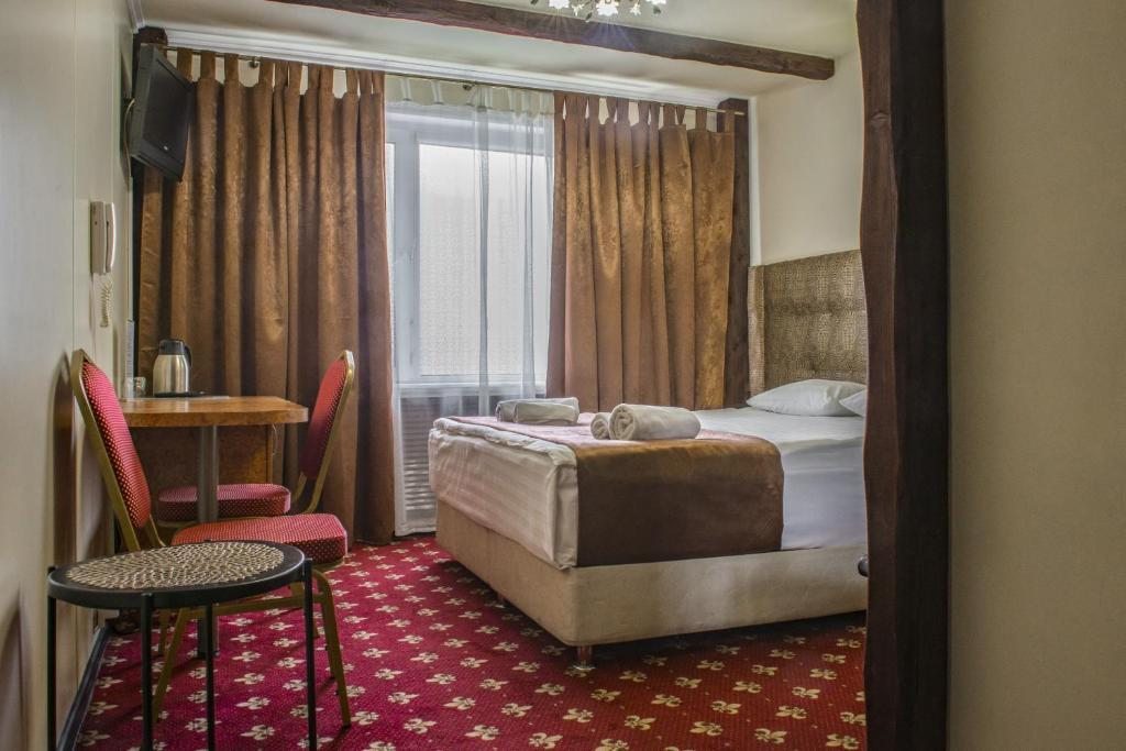 Сьюит (Номер двухкомнатный c кроватью Queen-size, диван-кроватью, собственным SPA - гидромассажным мини бассейном) отеля Строгино Экспо, Москва