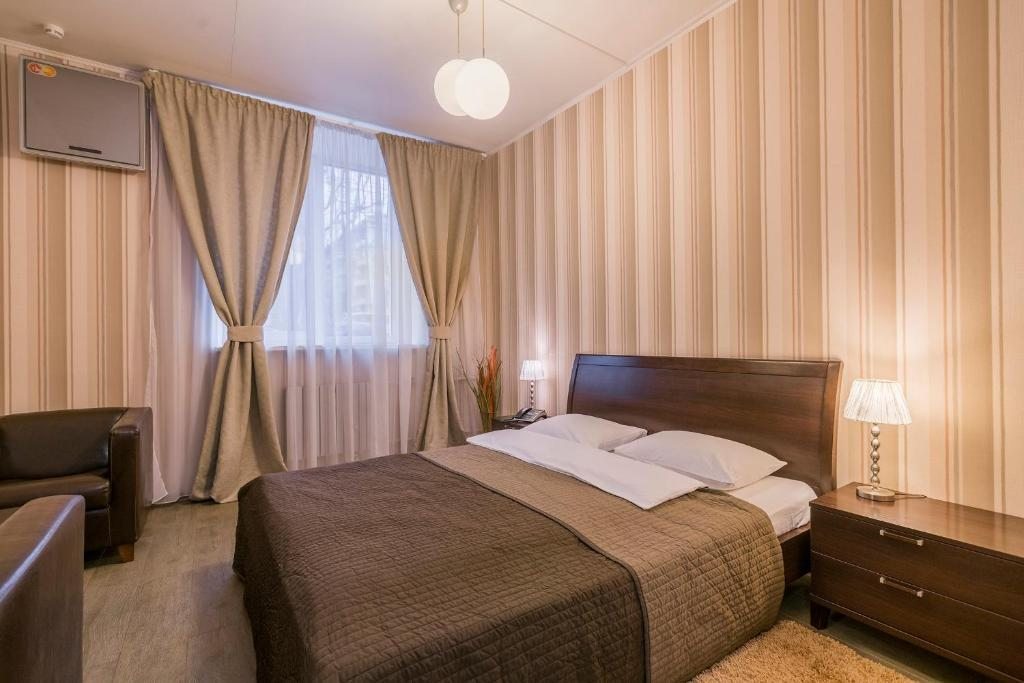 Двухместный (Двухместный номер Комфорт с 1 большой кроватью или 2 отдельными кроватями) мини-отеля Персона, Москва