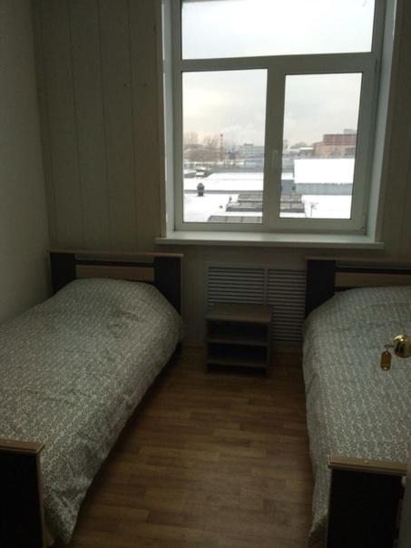 Номер (Односпальная кровать в общем номере с 3 кроватями) отеля Эстет, Москва