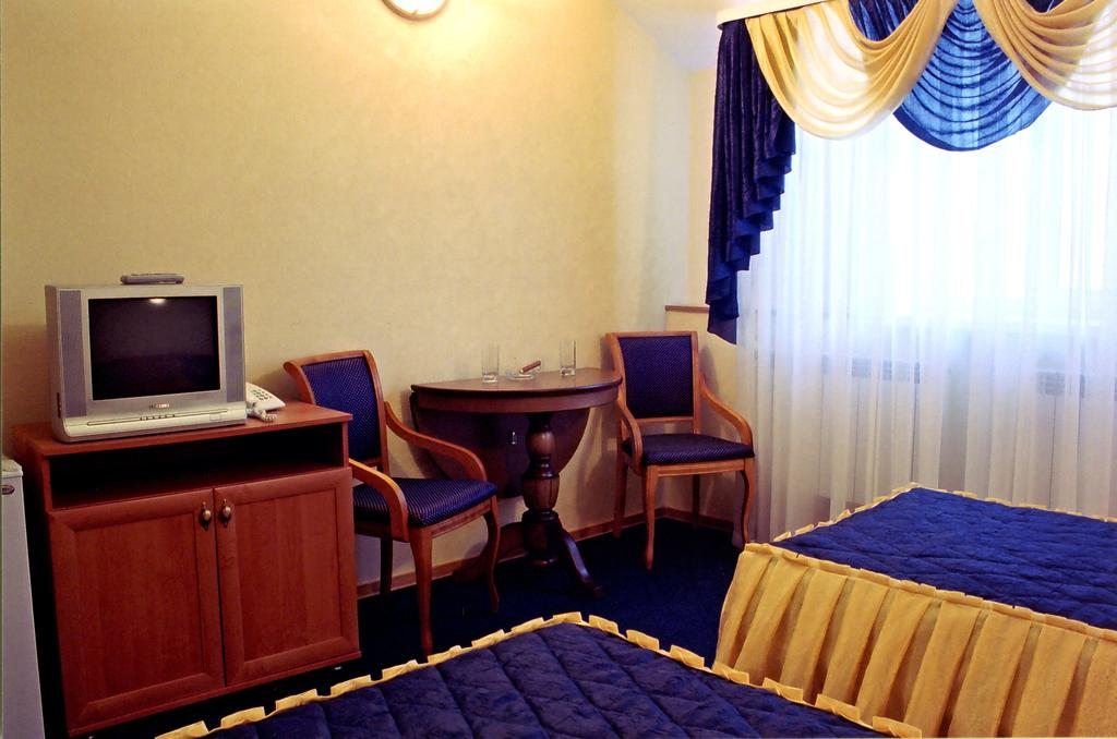 Двухместный (Двухместный номер с 2 отдельными кроватями и ванной комнатой) отеля Монарх, Рязань
