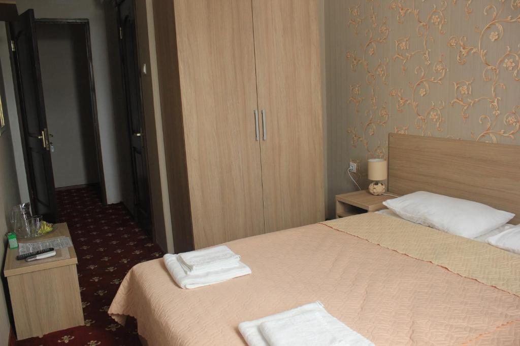 Двухместный (Большой двухместный номер с 1 кроватью или 2 отдельными кроватями) отеля Акуа, Сухум