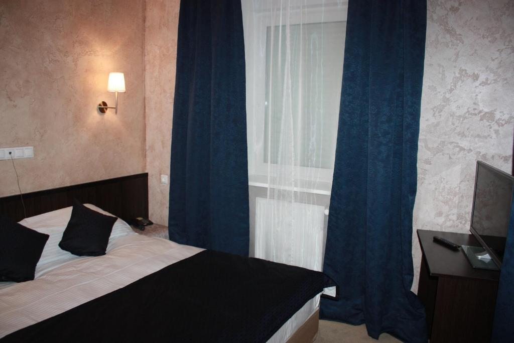 Двухместный (Стандартный двухместный номер с 1 кроватью или 2 отдельными кроватями) гостиницы Меридиан, Котляково