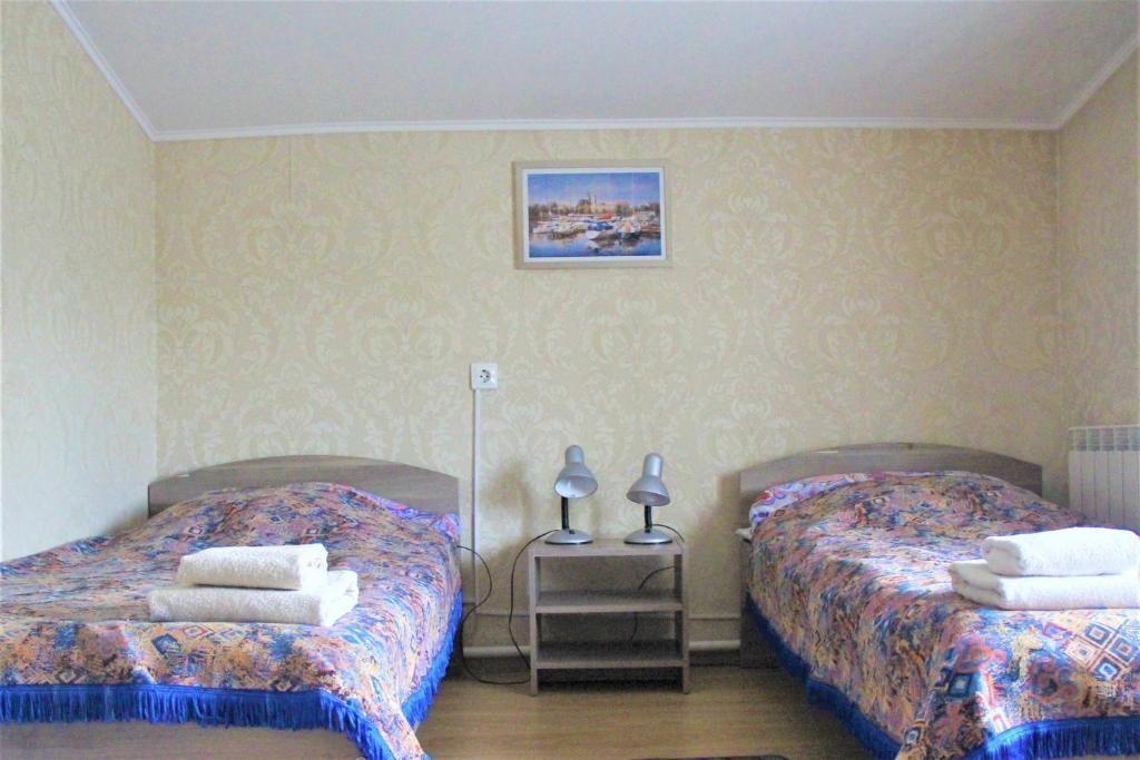 Двухместный (Бюджетный двухместный номер с 2 отдельными кроватями) гостевого дома На Комсомольском, Луга