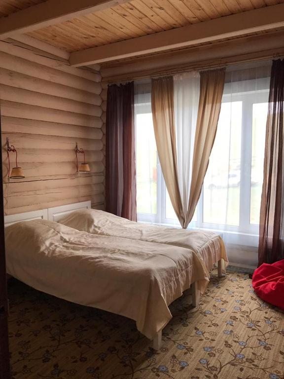 Двухместный (Стандартный двухместный номер с 2 отдельными кроватями) гостевого дома Воробьёвы горы, Сарма