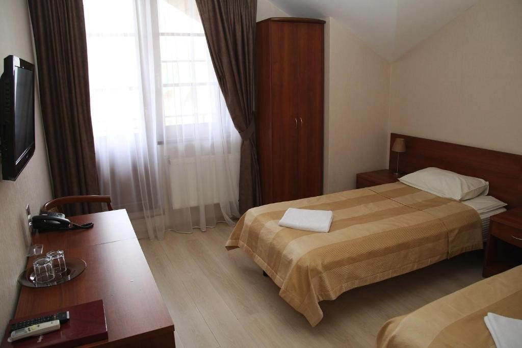 Двухместный (Двухместный номер «Комфорт» с 2 отдельными кроватями) гостиницы Визави, Старая Русса